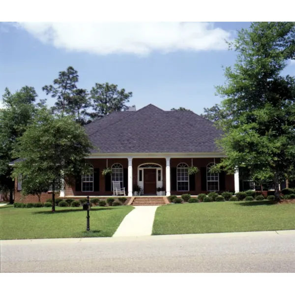 Ranch Has Brick Exterior And Arched Windows Around The Front Door 