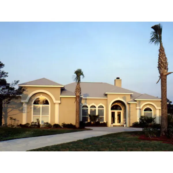 Sleek Stucco Home Has Rounded Windows And Front Entry