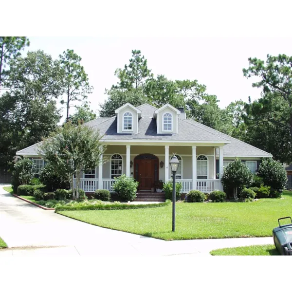 Home With Covered Porch Has Stylish Southern Charm 