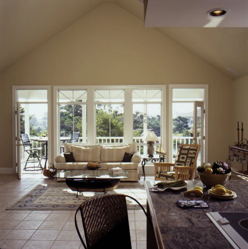 Sunbelt House Plan Living Room Photo 02 - Dresden Raised Beach Home 024D-0609 - Search House Plans and More
