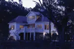 Colonial House Plan Rear Night Photo 01 - Highcroft Manor Luxury Home 024S-0037 - Search House Plans and More