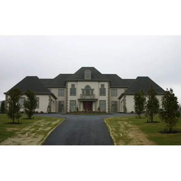 European Home Has Majestic Balcony And Twin Chimneys