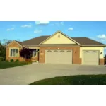 Three Double Windows Decorate The Front Of This Ranch Home