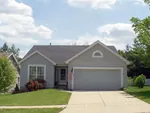 Modest Brick Ranch House With Front Entry Garage