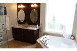 Traditional House Plan Bathroom Photo 01 - Wintertrail Sunbelt Home 032D-0106 - Shop House Plans and More