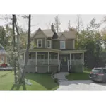 Two-Story Farmhouse Design Has Grand Wrap-Around Porch