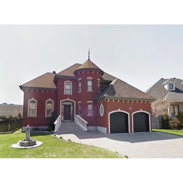 Brick Two-Story Home With Turret