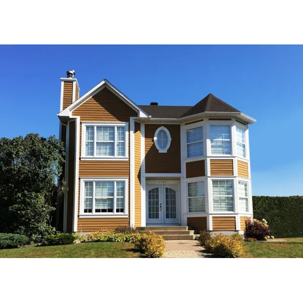 Stucco Victorian Home Has A Turret For Added Light