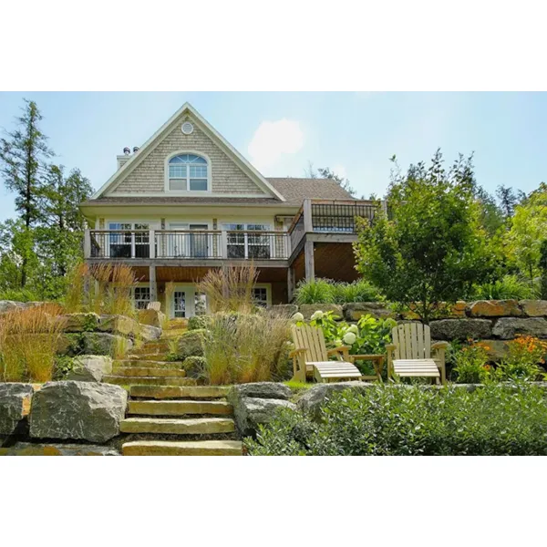 A Rear Deck Adds An Abundance Of Outdoor Living Area To This Lake House