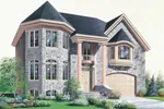 This Two-Story Stone Home Has A Turret And Bay Window
