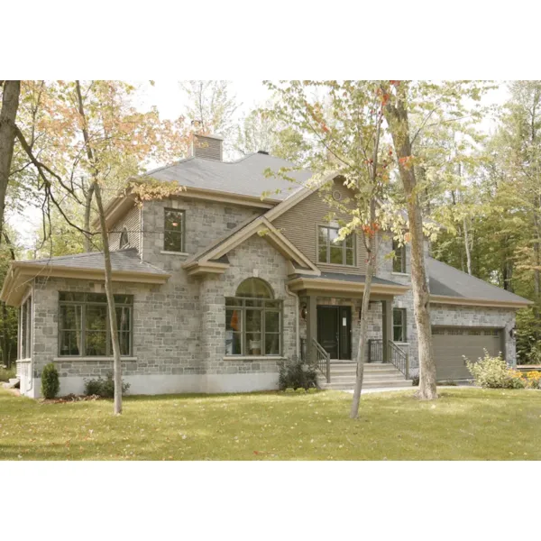 Traditional Home Has Two Stories And Sunny Windowed Room On One Side