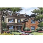 Traditional Country Two-Story With Stucco And Brick Exteriors