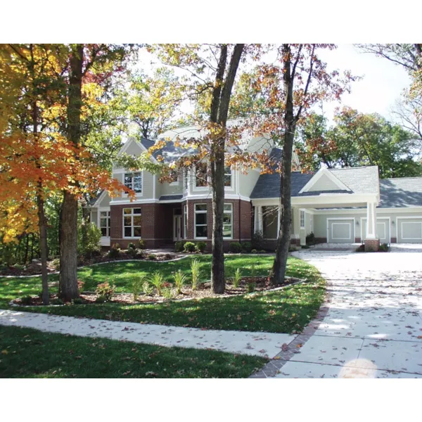 Two-Story Brick Home Has Striking Turret 