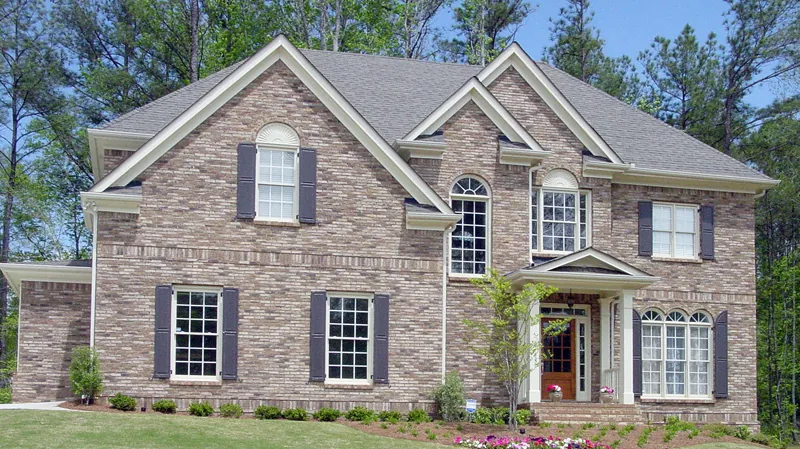 Stone Two-Story With European Style Formality