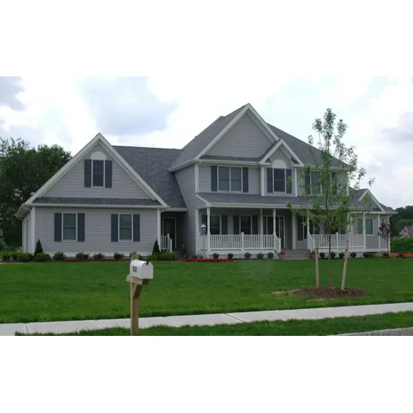 Shingle Sided Farmhouse With Luxurious Style