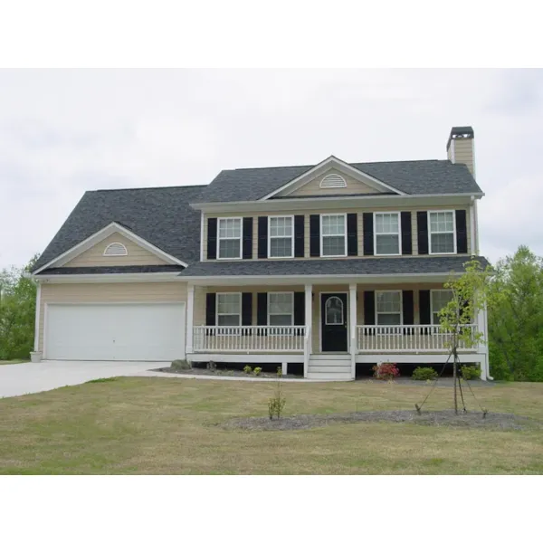 Two-Story Home Has Modern Farmhouse Appeal And A Covered Porch 