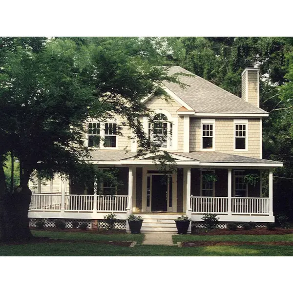 Raised Lowcountry Style Two-Story Home With Inviting Wrap-Around Porch