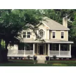 Raised Lowcountry Style Two-Story Home With Inviting Wrap-Around Porch