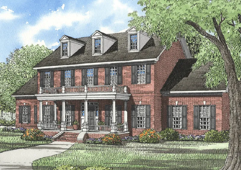 Traditional Two-Story Brick House With Pillared Porch And Balcony Above