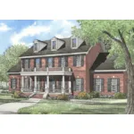 Traditional Two-Story Brick House With Pillared Porch And Balcony Above