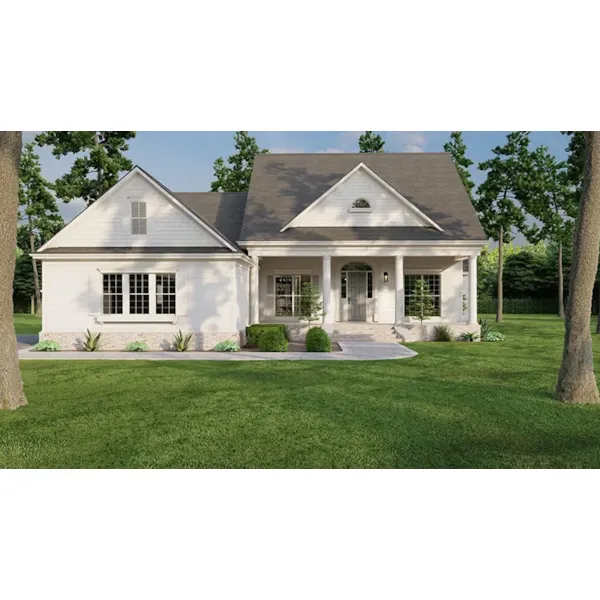 Shingle Sided Dormers Add Interest To This Two-Story House