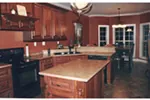 Luxury House Plan Kitchen Photo 04 - Eckhert Luxury Traditional Home 055D-0104 - Search House Plans and More