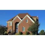 Home With Dramatic Arched Brick Entry