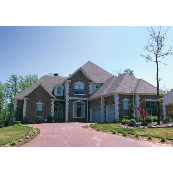 Grand European Style Two-Story With Decorative Corner Quoins