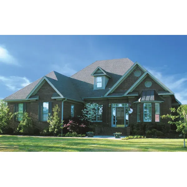 Traditional Two-Story House With Brick Exterior And A Bay Window