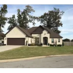 Arched Entry Is Just Part Of This Traditional Homes Style