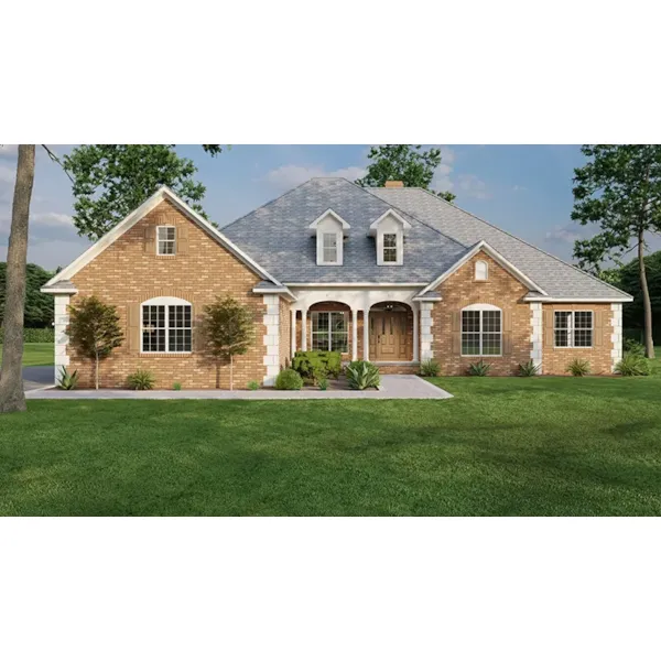 Brick Ranch Home With Corner Quoins And Arched Soffit On The Covered Front Porch