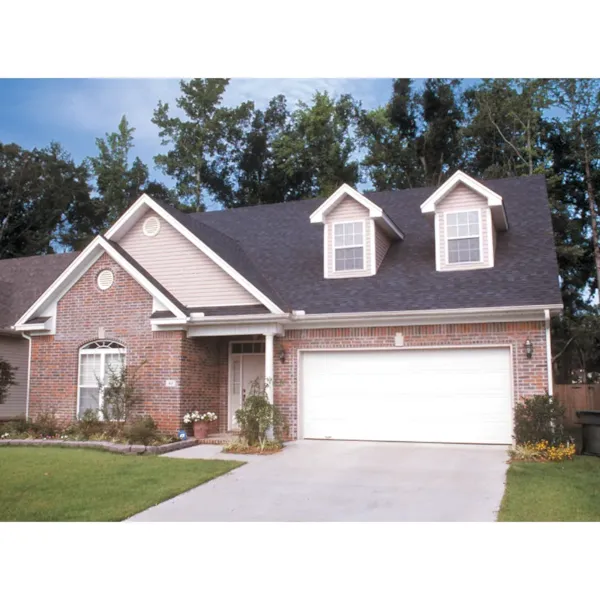 Dormers Decorate Façade Of This Home