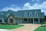 Country Style Traditional Home With Triple Dormers And Covered Porch