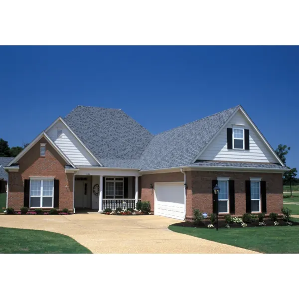 Traditional Home Has Country Charm With A Friendly Covered Porch