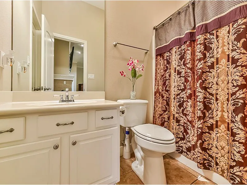 Luxury House Plan Bathroom Photo 02 - Bidwell Bay Sunbelt Home 055D-0493 - Search House Plans and More