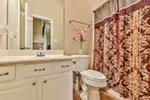 Luxury House Plan Bathroom Photo 02 - Bidwell Bay Sunbelt Home 055D-0493 - Search House Plans and More