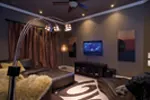 Traditional House Plan Theater Room Photo 01 - Luxury One-Story House | Traditional Ranch House