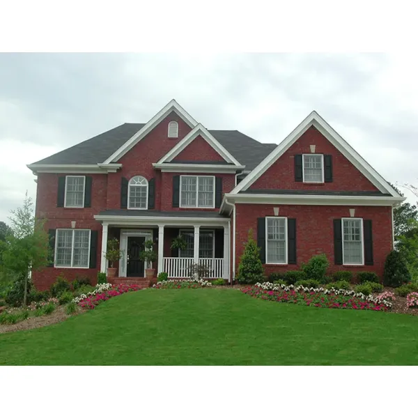 Stylish Two-Story Brick Traditional House With Front Loading Garage