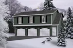 A three-car apartment garage with a colonial style influence