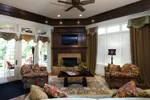 European House Plan Family Room Photo 01 - Chateau Luxe Country French Home 065S-0033 - Search House Plans and More