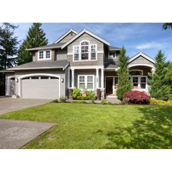 Shingle Siding Provides Additional Charm To This House