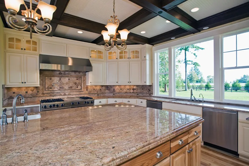 Southern House Plan Kitchen Photo 01 - Lydelle Luxury Craftsman Home | Luxury Craftsman Home Designs