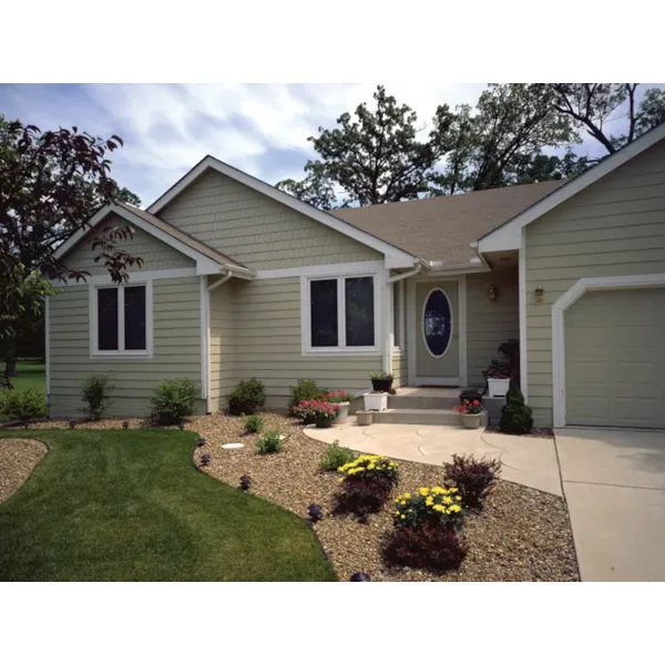 Traditional Ranch Has Siding Exterior And Victorian Door With Oval Shaped Window