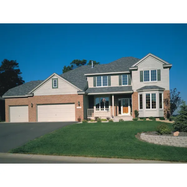 Classic And Traditional Two-Story With Brick And Siding