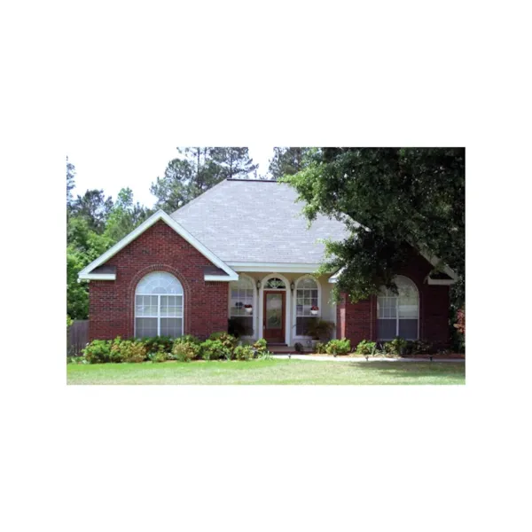 Stylish Arched Windows Cover The Front Of This Ranch Home