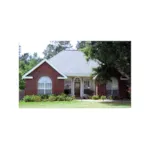 Stylish Arched Windows Cover The Front Of This Ranch Home