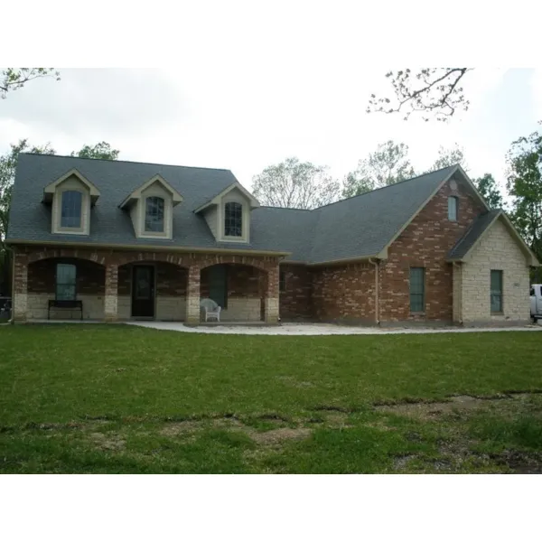 Country Home With Trio Of Dormers For An Abundance Of Natural Light