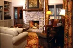 Rustic House Plan Fireplace Photo 01 - Wells Branch Cabin Farmhouse 082D-0065 - Shop House Plans and More