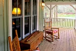 Rustic House Plan Porch Photo 01 - Wells Branch Cabin Farmhouse 082D-0065 - Shop House Plans and More