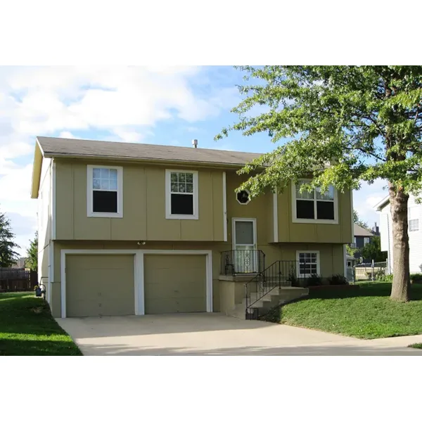 Vertical Siding Gives This Split-Level House Unique Style